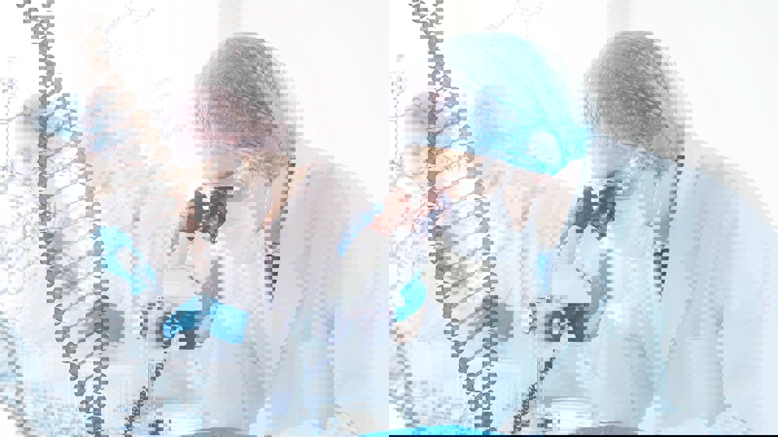 Scientist analysing sample under microscope