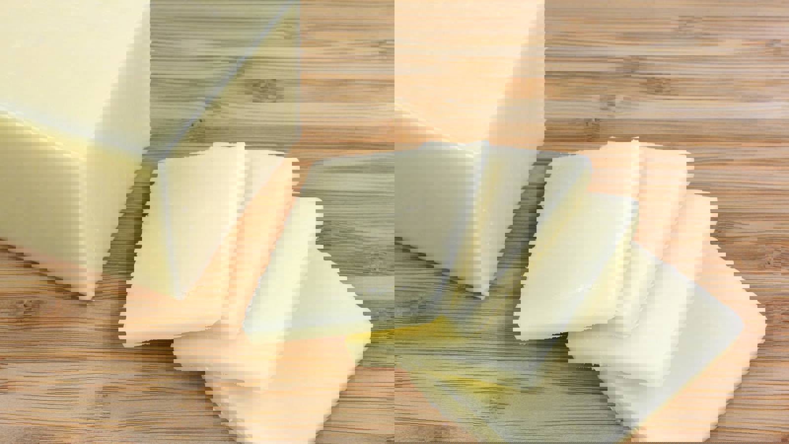 Slices of hard cheese cut in equal widths