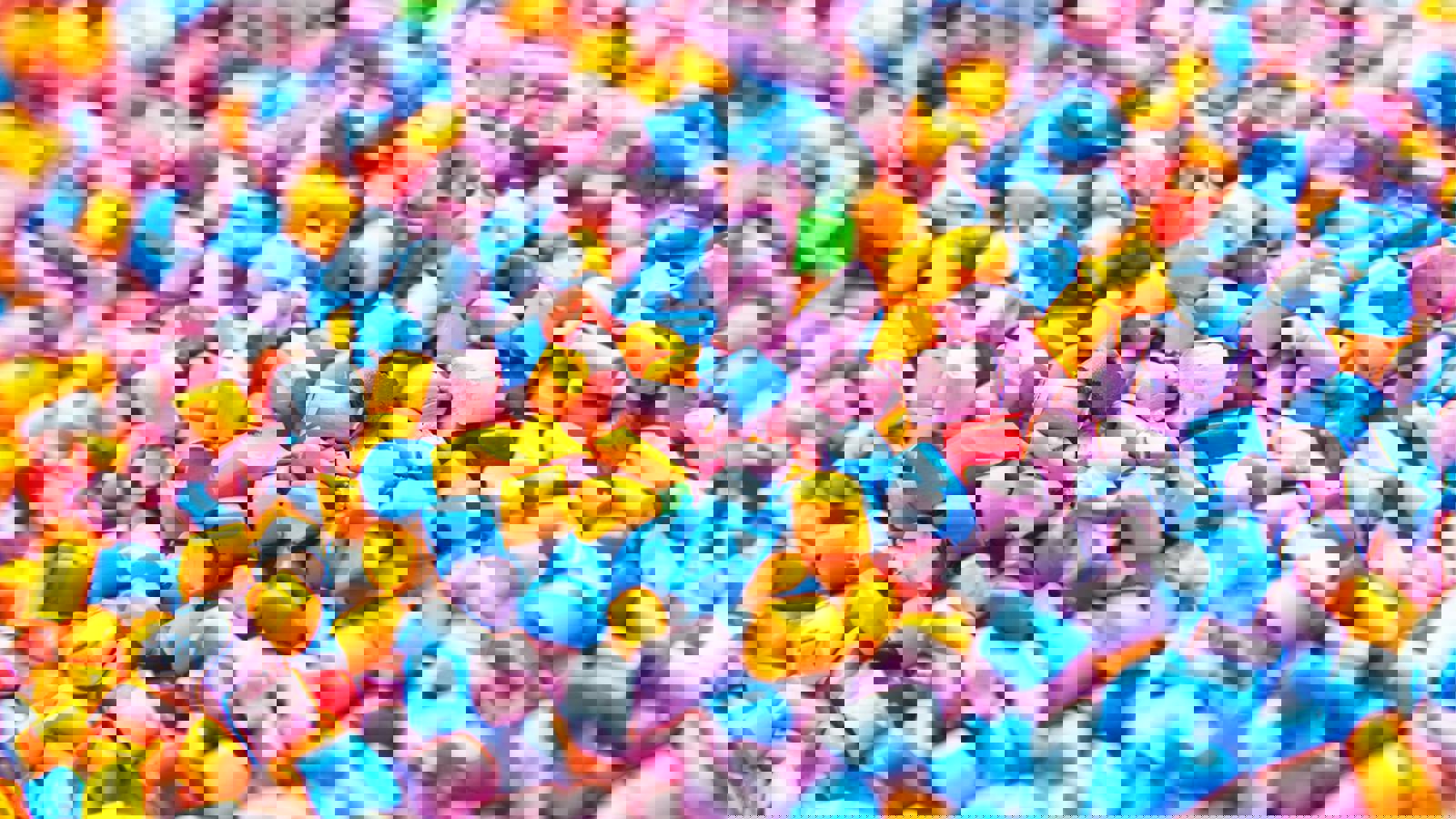 Multi-coloured polymer granules