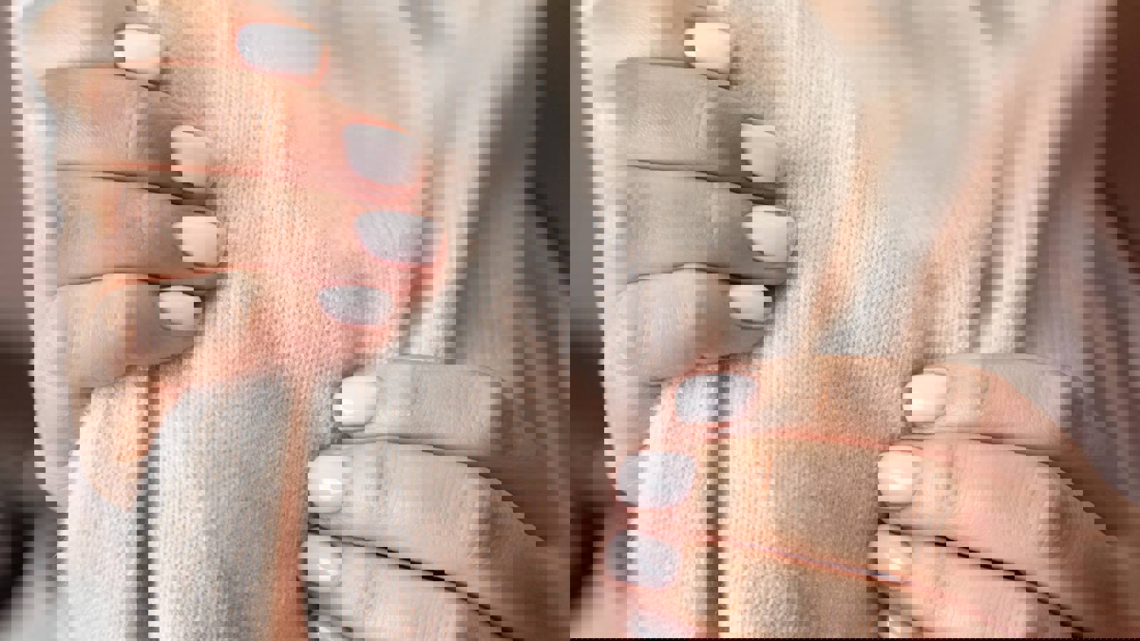 Female hands holding soft woollen material