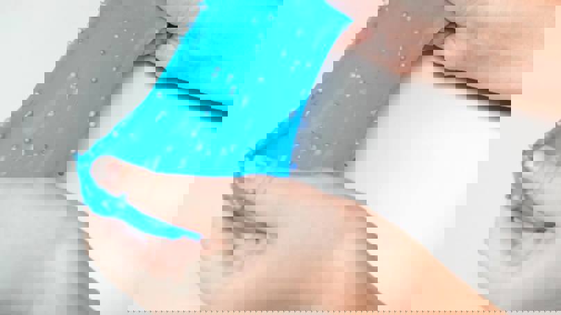 Hands Stretching Malleable Material