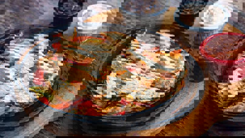 Plate Of Chicken Strips And Condiments