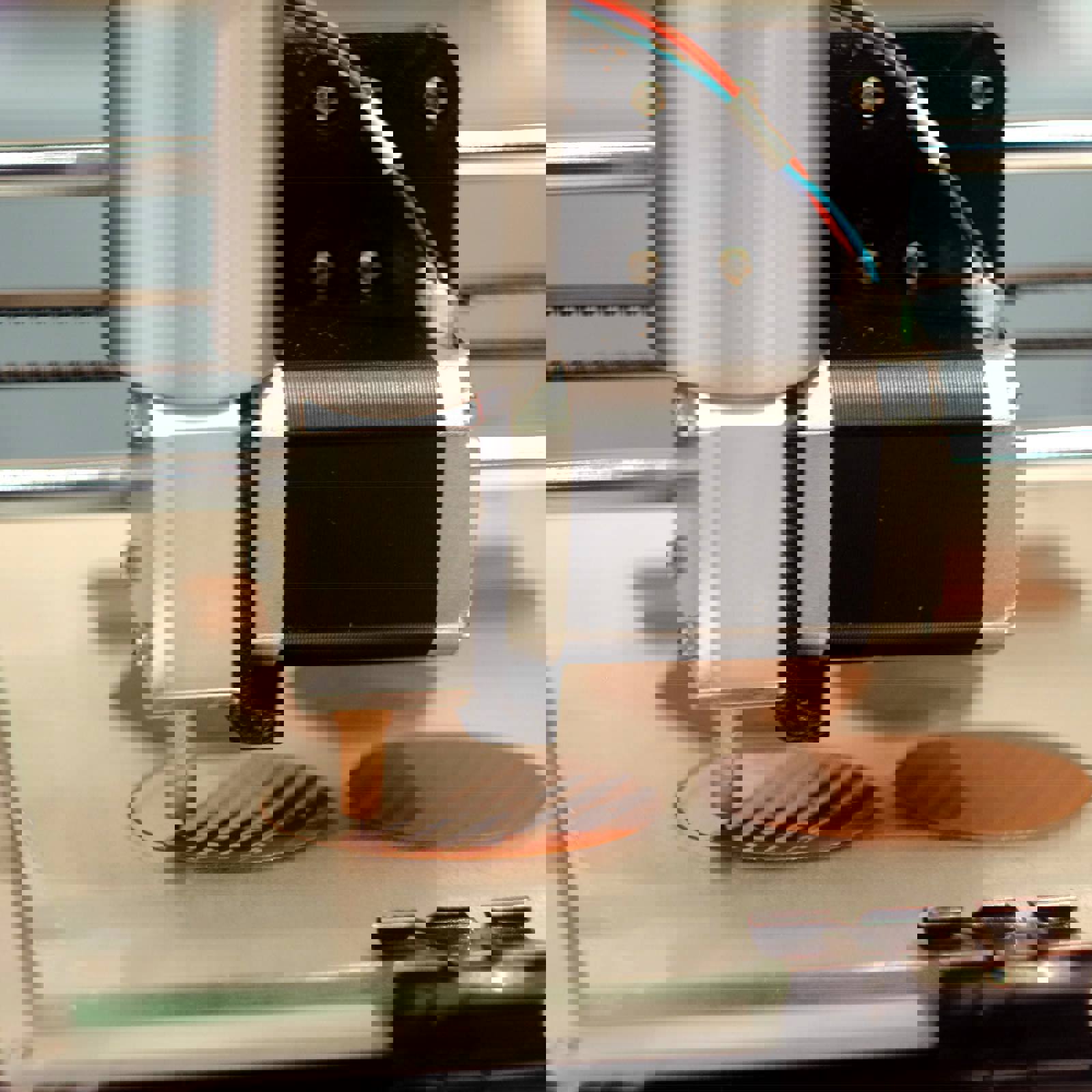 3D printer printing disc of chocolate