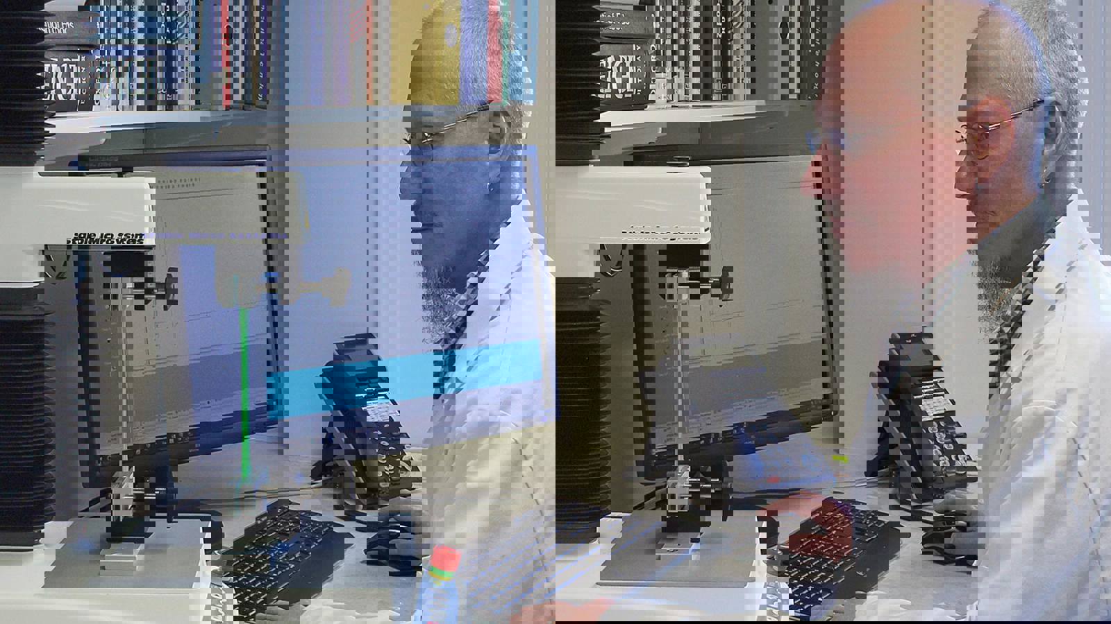 Man in white coat using Texture Analyser