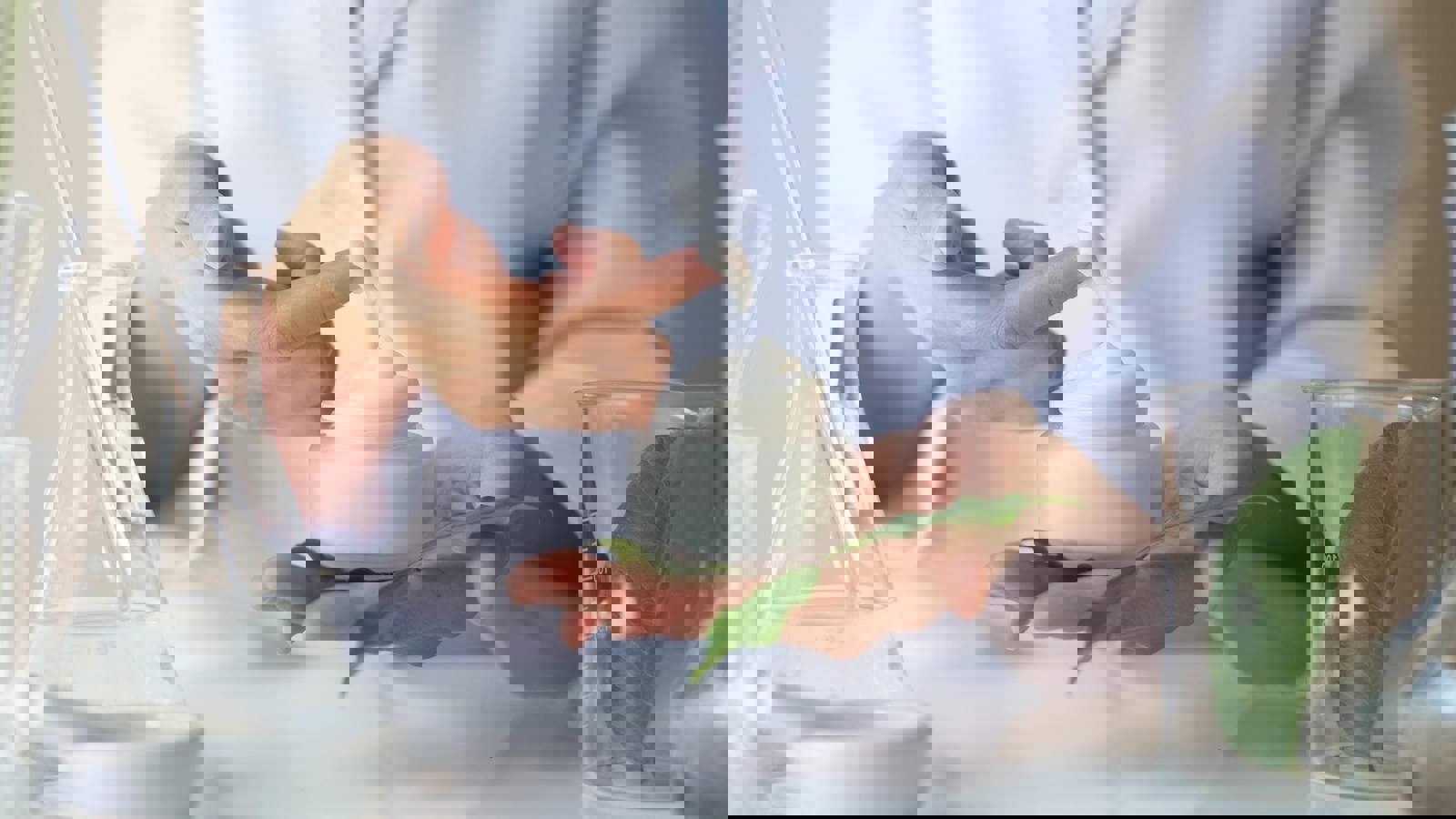 Woman applying cosmetic cream to finger