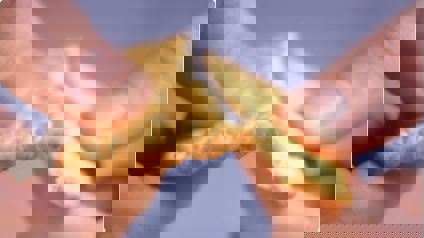 Cracker Being Snapped In Half